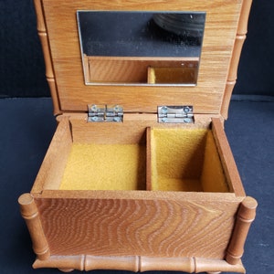 Wood Music Jewelry Box with Gold Felt Interior and Bamboo Look Detail Plays The Entertainer - Schmid Brothers Inc