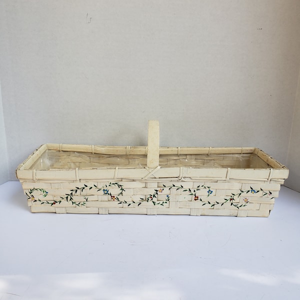 Oblong Narrow Bamboo Basket with Handle and Plastic Liner Painted White with Floral Detail