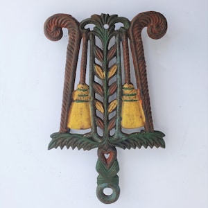 Painted Lincoln Drape, Tassel and Grain or Double Broom Vintage Cast Iron Trivet