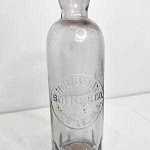 Antique Purple Tint Bottle for Holberg Bottling Co Mobile Ala