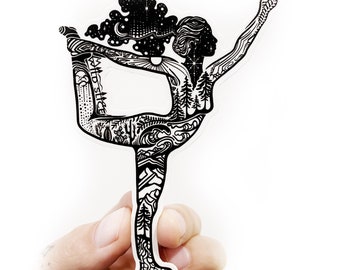 May include: Black and white sticker of a woman in a yoga pose, with a detailed design of nature elements like trees, mountains, and waves.