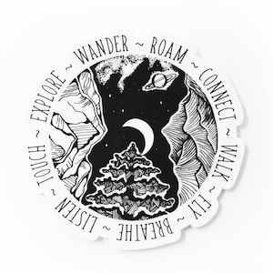 May include: Black and white illustration of a mountain landscape with a crescent moon, a planet, and a pine tree. The illustration is surrounded by a circle of text that reads: "BREATHE ~ LISTEN ~ TOUCH ~ EXPLORE ~ WANDER ~ ROAM ~ CONNECT ~ WALK ~ FLY"
