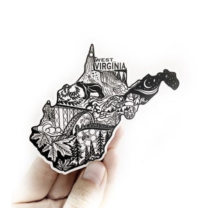 May include: Black and white illustration of the state of West Virginia, filled with various icons representing the state's natural beauty, culture, and history. The illustration includes a bear, a waterfall, a bridge, a mountain, a forest, a river, a moon, and stars.