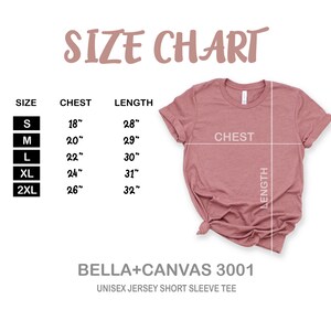 May include: Size chart for a unisex jersey short sleeve tee, showing measurements in inches for chest and length. Sizes include S, M, L, XL, and 2XL. The chart is printed on a white background with a pink shirt displayed next to it.