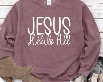 Jesus Heals All Sweatshirt: Christian Fleece Crew Pullover