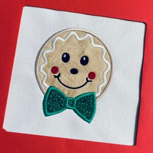 Gingerbread boy face applique design,boy gingerbread applique design,boy gingerbread applique,boy gingerbread design,gingerbread applique