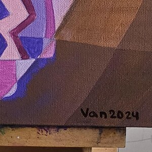 May include: Abstract painting on canvas with geometric shapes in shades of pink, purple, and brown. The artwork features a zigzag pattern and the artist's signature, "Van 2024," in the lower right corner. The canvas is mounted on a wooden frame.