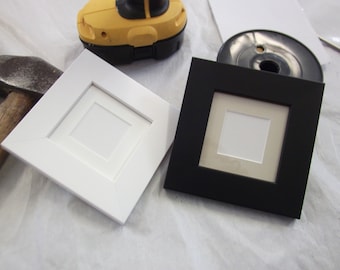 9cm x 9cm for 2" x 2" photo