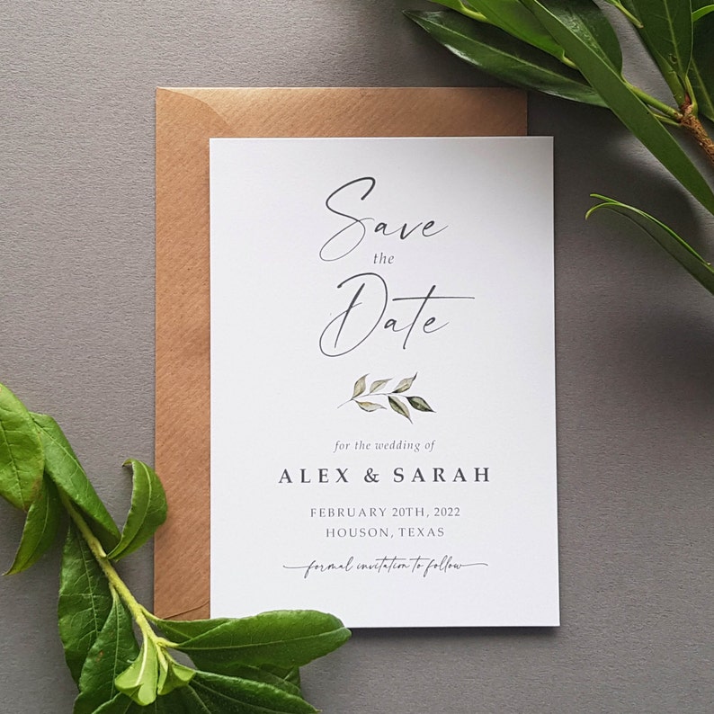 Greenery save the date card with eucalyptus. includes couples name, venue and wedding date with formal invitation to follow