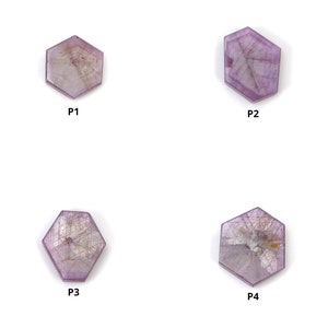 May include: Four flat, hexagonal-shaped light purple gemstones labelled P1, P2, P3, and P4. Each stone displays a translucent appearance with visible internal crystalline structures, geometric facets, and subtle variations in colour saturation.