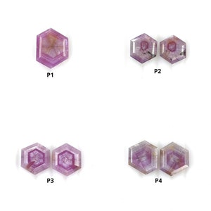 May include: Four sets of faceted, hexagonal, purple gemstones. Each set is labelled with a letter and number, P1, P2, P3, and P4.