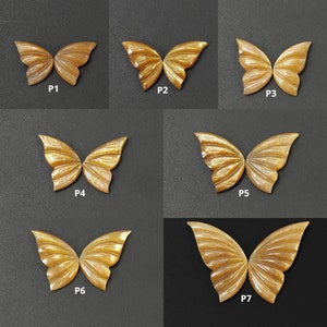 May include: Seven gold butterfly-shaped sunstone cabochons, each with a unique pattern and shimmer. The stones are labeled P1 through P7.