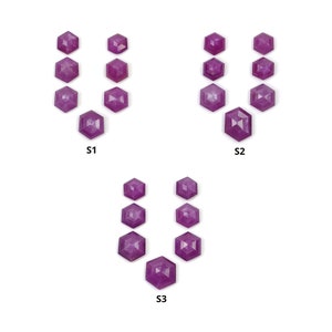 May include: Three sets of purple gemstones arranged in a U shape. Each set is labelled S1, S2, and S3.