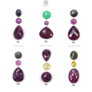 May include: Six sets of gemstones, each set includes a large teardrop-shaped gemstone, a smaller hexagonal gemstone, and a round gemstone. The large gemstones are all purple, the hexagonal gemstones are pink, and the round gemstones are various colors, including blue, green, gray, and yellow.
