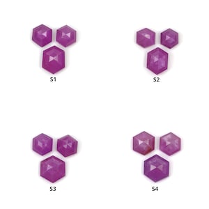 May include: Four sets of three pink faceted gemstone cabochons, each set arranged in a triangular shape. The sets are labeled S1, S2, S3, and S4.