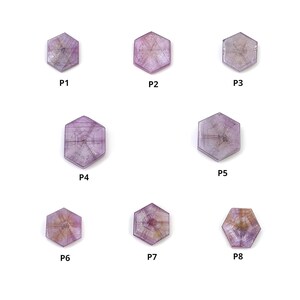 May include: Eight hexagonal, translucent, light purple gemstones labelled P1 through P8. Each stone displays a distinct internal star-like pattern with radiating lines and subtle colour variations, ranging from pale lavender to soft pinkish-brown hues.