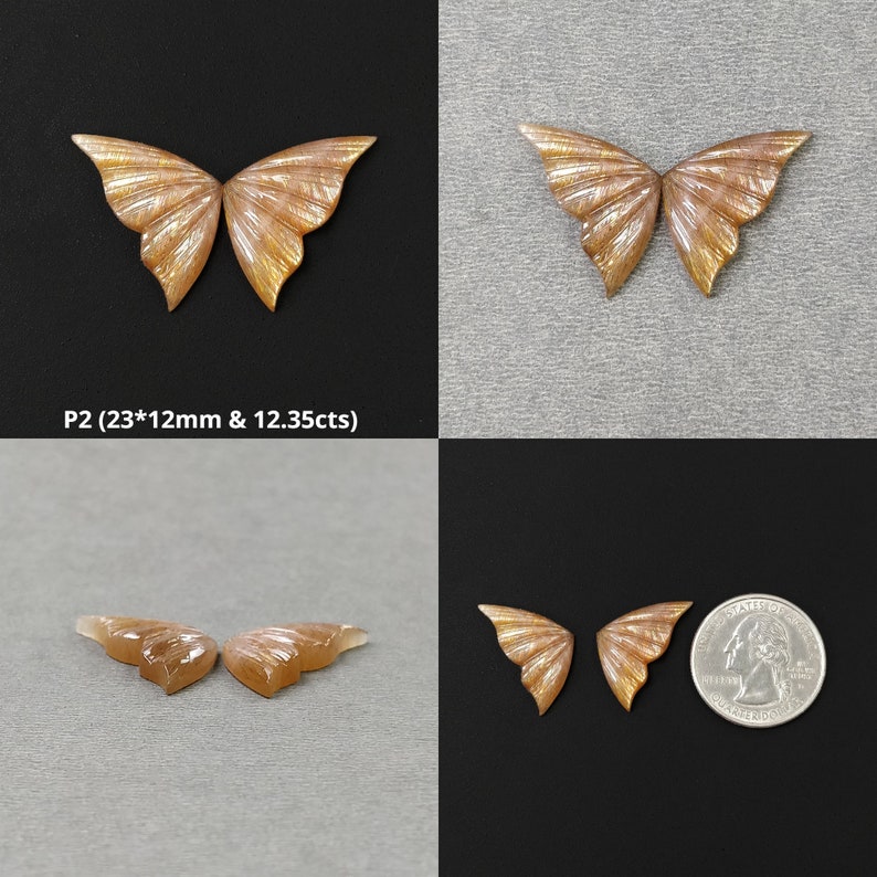 May include: Two pairs of iridescent butterfly-shaped sunstone cabochons. The cabochons are a light peach color with a shimmery finish. The cabochons are approximately 23mm by 12mm and weigh 12.35 carats.