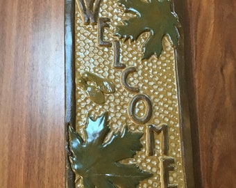 Craftsman Welcome Sign, Maple leaf, vertical, ocher and green.