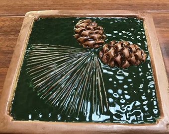 6 inch Ponderosa Pinecone Tile for fireplace & kitchen, Craftsman,  dark gloss green/metallic copper glaze.