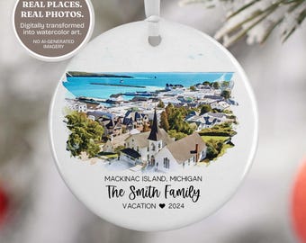 May include: A round white ceramic ornament featuring a watercolor-style illustration of Mackinac Island, Michigan. Text reads: MACKINAC ISLAND, MICHIGAN, The Smith Family, VACATION 2024. A white ribbon is attached to the top for hanging.