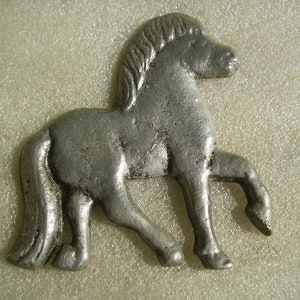 Cheval de signe en aluminium coulé