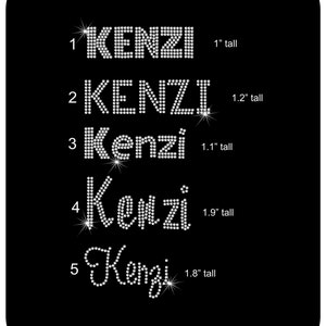 May include: Five different sizes of the name "Kenzi" made with rhinestones. The sizes are 1 inch, 1.2 inches, 1.1 inches, 1.9 inches, and 1.8 inches tall.