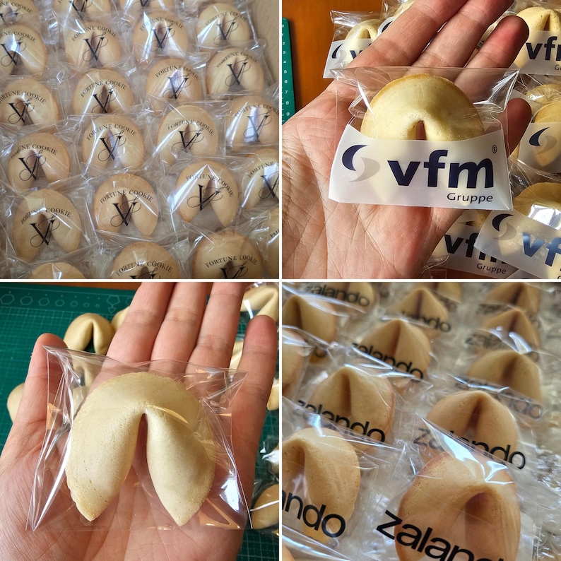 Puede incluir: Una colecci&oacute;n de galletas de la fortuna envueltas individualmente, cada una con un logotipo impreso en el envoltorio de pl&aacute;stico transparente. Algunas galletas muestran el texto vfm Gruppe, otras Zalando o un logotipo en V estilizado.