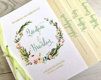 May include: A white wedding program with a green floral wreath and the names Quintina & Brandon in green script. The text "The Marriage and Celebration of" is at the top and "Langham Huntington Pasadena, California" is at the bottom.