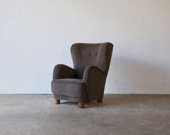 A High Back Arm Chairs, Upholstered in Pure Alpaca Wool