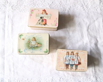 set of 3 vintage Caffarel boxes in pastel pink and blue colors, relief, bonbon
