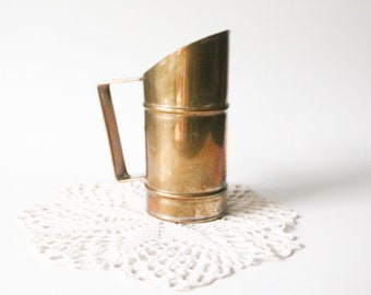 Vintage brass jug with handle