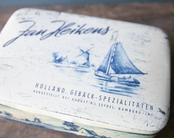 Vintage box tin box Jan Heinekens Holland Geback spezialitaten boats and mills blue and blue