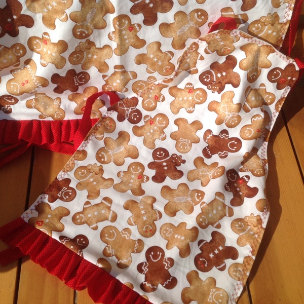 Gingerbread cookie print apron, 2 sizes, small and med. child, 1 piece full front, lined, ruffled hem, cotton, Christmas, washable, unique