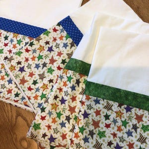 stars pillowcases set of 2, multicolored stars, border or pillowcase, std or queen, cotton, washable, Christmas, Hanukkah, kwanza, 21x31 in.