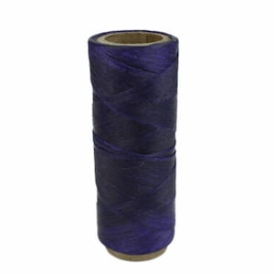 May include: A spool of dark purple waxed thread for leather crafting.