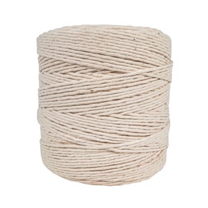 May include: A spool of natural-colored twine, perfect for crafting, gardening, or wrapping gifts.