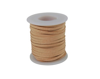 May include: A spool of light brown leather cord wrapped around a white plastic spool.