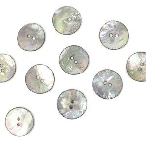 May include: Ten round, white, mother-of-pearl buttons with two holes each.
