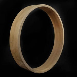 May include: A natural wood hoop with a smooth, light brown finish. The hoop is round and has a diameter of approximately 18 inches.