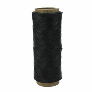 May include: A spool of black waxed thread for leather crafting.