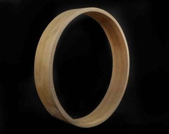 May include: A natural wood hoop with a smooth, light brown finish. The hoop is round and has a diameter of approximately 18 inches.