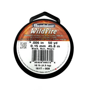 May include: A spool of black WildFire thermally bonded bead weaving thread. The label includes the text ".006 in 50 yd", "0.15 mm 45.8 m", and "Black, Noir, Negro". The spool weighs 10 lb (4.5 kg).