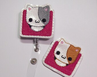 Cat in Raspberry Box Badge Reel