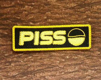 Bold and Playful "Piss" Soda Embroidered Patch - Unique Pop Culture Statement