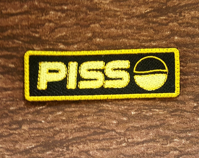 Bold and Playful "Piss" Soda Embroidered Patch - Unique Pop Culture Statement