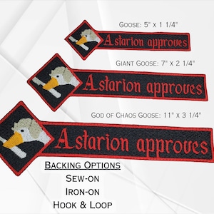 May include: Three embroidered iron-on patches featuring a cartoon goose with the text "Astarion approves" in red. The patches are available in three sizes: 5 inches by 1 1/4 inches, 7 inches by 2 1/4 inches, and 11 inches by 3 1/4 inches. The patches are available with sew-on, iron-on, or hook and loop backing.
