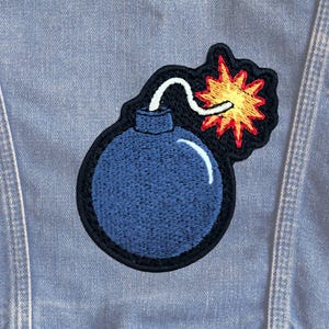 Estilo de dibujos animados Boom, parche bordado, inspirado en DCC, Carl Donut y Mongo