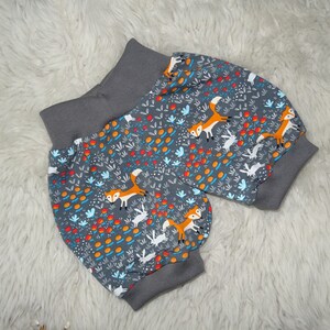 Shorts de malha pump - animais da floresta