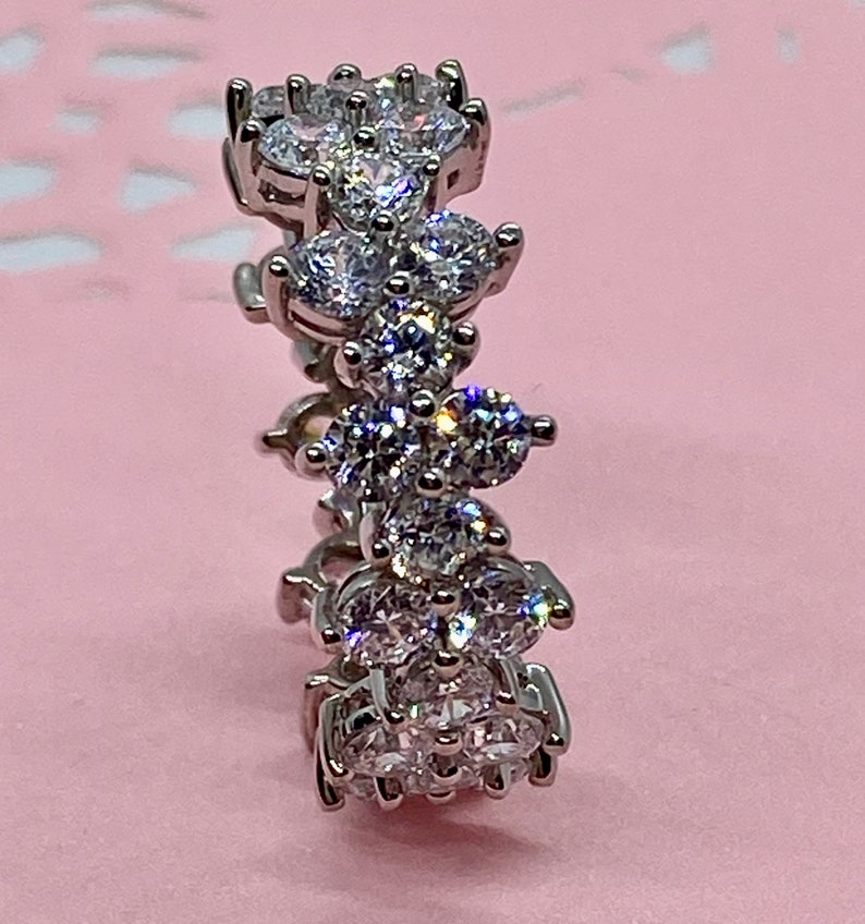 Fancy Round Cut Cubic Zirconia Eternity Band in WGP Sterling Silver