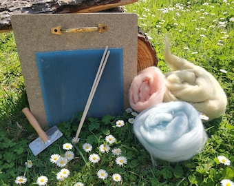 Blending board for fiber mixing colours create rolags to spin. Carding mat for wool with sticks and carder brush, spinning wheel accessories